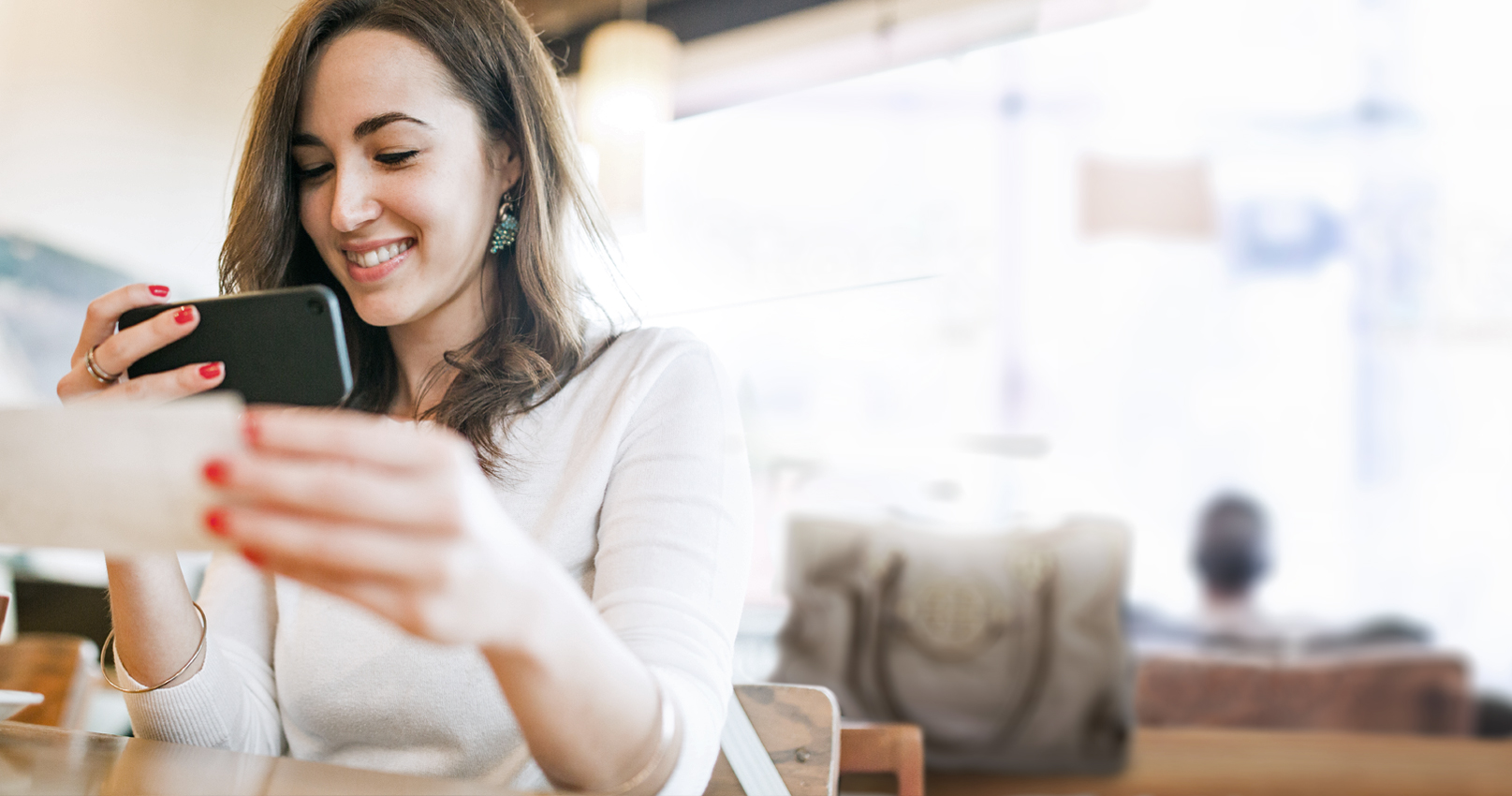 Picture of a woman using mobile deposit