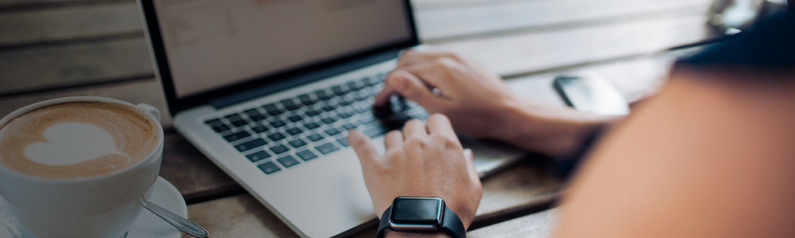 picture of a person working on a laptop